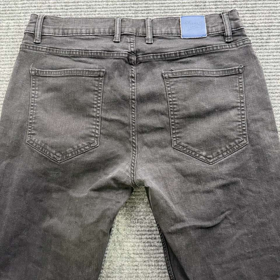 Pantalones de mezclilla Mugsy para hombre 34*x30 negros con tintas de calamar elásticos calce ajustado informales Foto 2 de 4