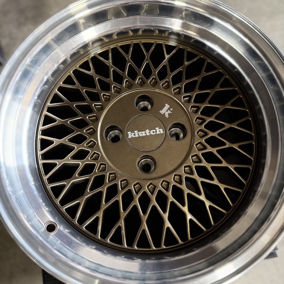 Used 15x8.5 Klutch SL1 4x100 17 73.1 Bronze Machined Lip Wheels