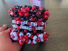 QUEEN OF HEARTS KANDI CUFF WITH 20 BEADS AROUND THE XBASE IDK HOW TO SAY IT