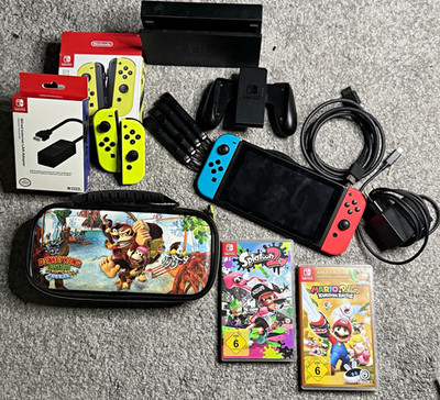 Nintendo Switch Zubehörpaket: Dock, Joy-Con, Grip, Netzteil, HDMI + Spiele