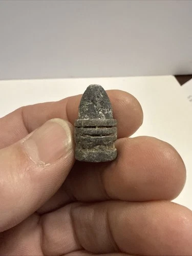 This is a lead projectile, likely a Civil War era bullet.