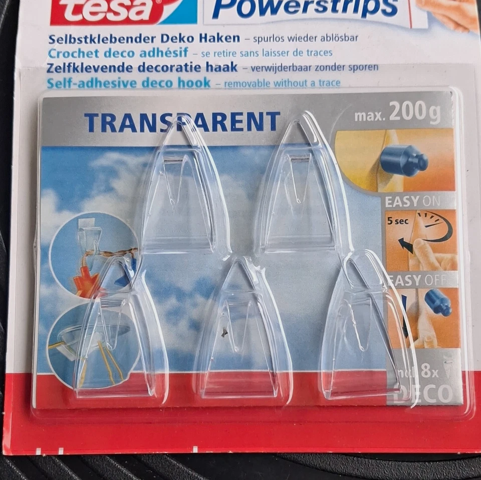 tesa Powerstrips selbstklebende Deko-Haken transparent max. 200 g, 5 Stück - Bild 1 von 1