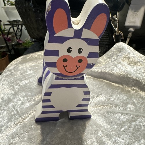 Melissa & Doug First Play Safari Zany Zebra Wooden Grasping Baby Toy. Purple