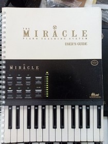 The Miracle Piano Teaching System Nintendo NES Cartridge and guide RARE