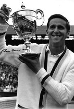 roy emerson on grass with his trophy after beating oppenent signed 12x8 photo