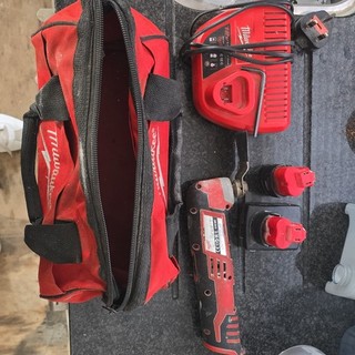 Milwaukee M12 12V multi tool with 2x batteries and charger