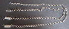 Pair of replacement chains with springs for attachment for Tonka log truck