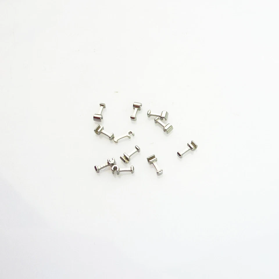 10 piezas Paradas dentales Ortodoncia Ganchos Prensables Cortos/Largos/Izquierdos Tubos Cruzados Brackets Foto 2 de 4