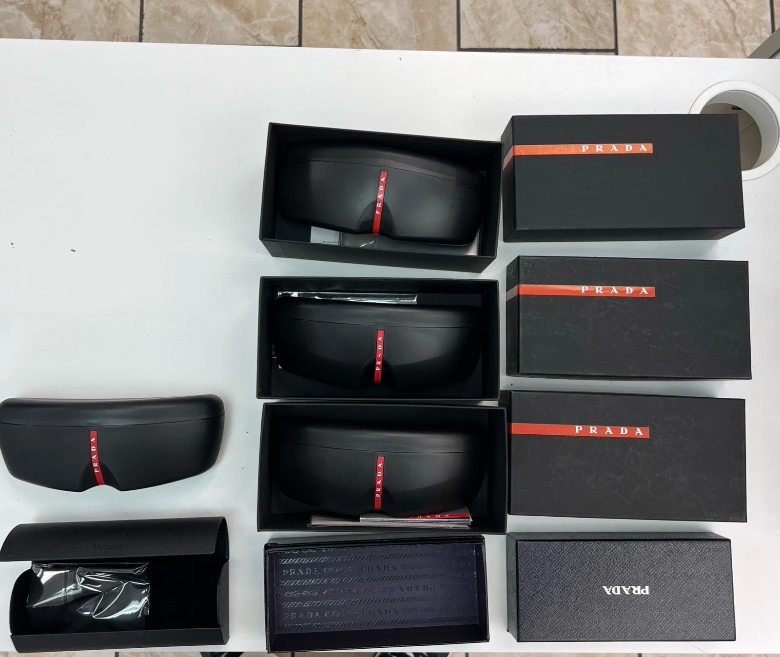 5 autentiche custodia per occhiali da sole Prada con panno