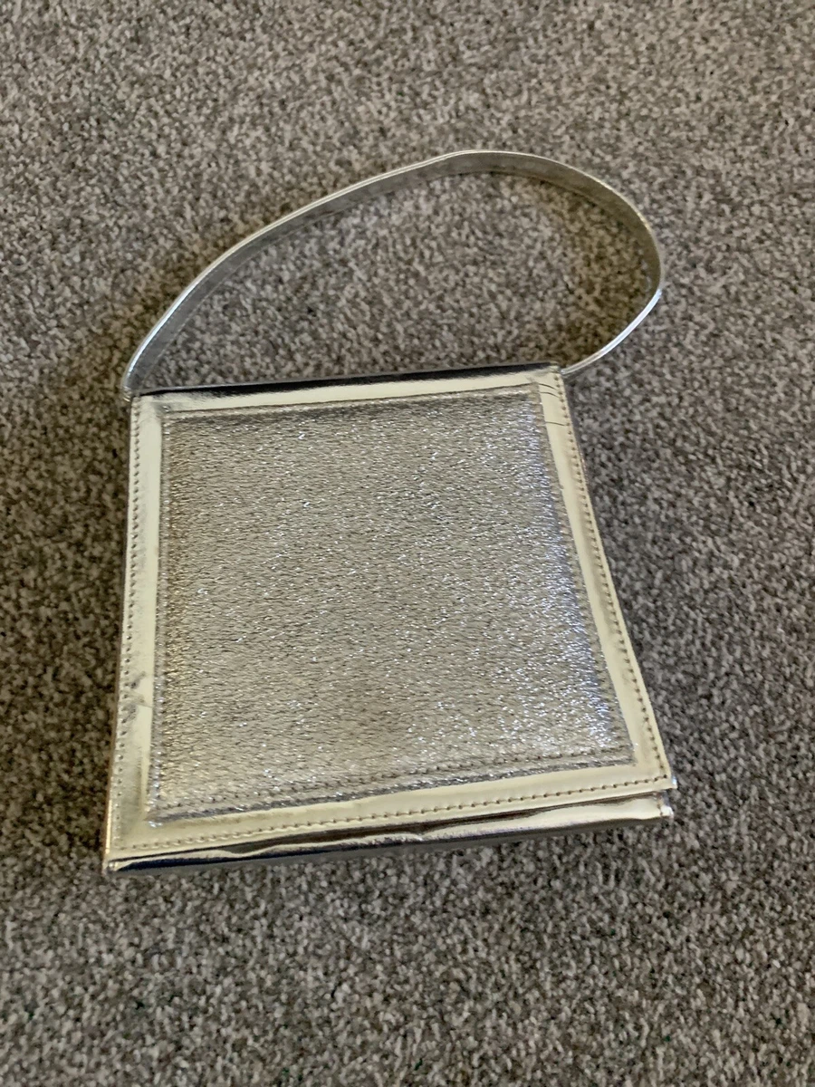 Silver triangle best sale bag