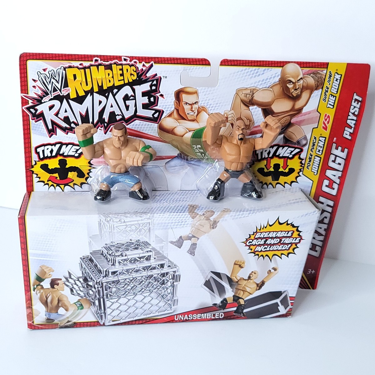 WWE Rumblers Rampage Crash Cage Table Super Jump The Rock VS John