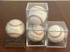 Lot Of 4 Signed Baseballs: Whitey Ford Pee Wee Reese Phil Rizzuto Clete Boyer