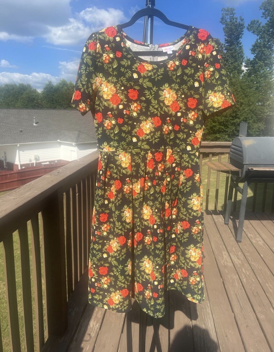 LuLaRoe Women's Black Floral Comfortable Stretchy Knit Dress With Side Pockets LuLaRoe Women's Black Floral Comfortable Stretchy Knit Dress With Side Pockets
