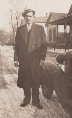 1930s Handsome Man Long Coat Fedora Standing Beside Car Snowy Street Scene 