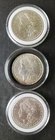 1881 O, 1886, and 1887 S $1 Morgan Silver Dollars in Capsules