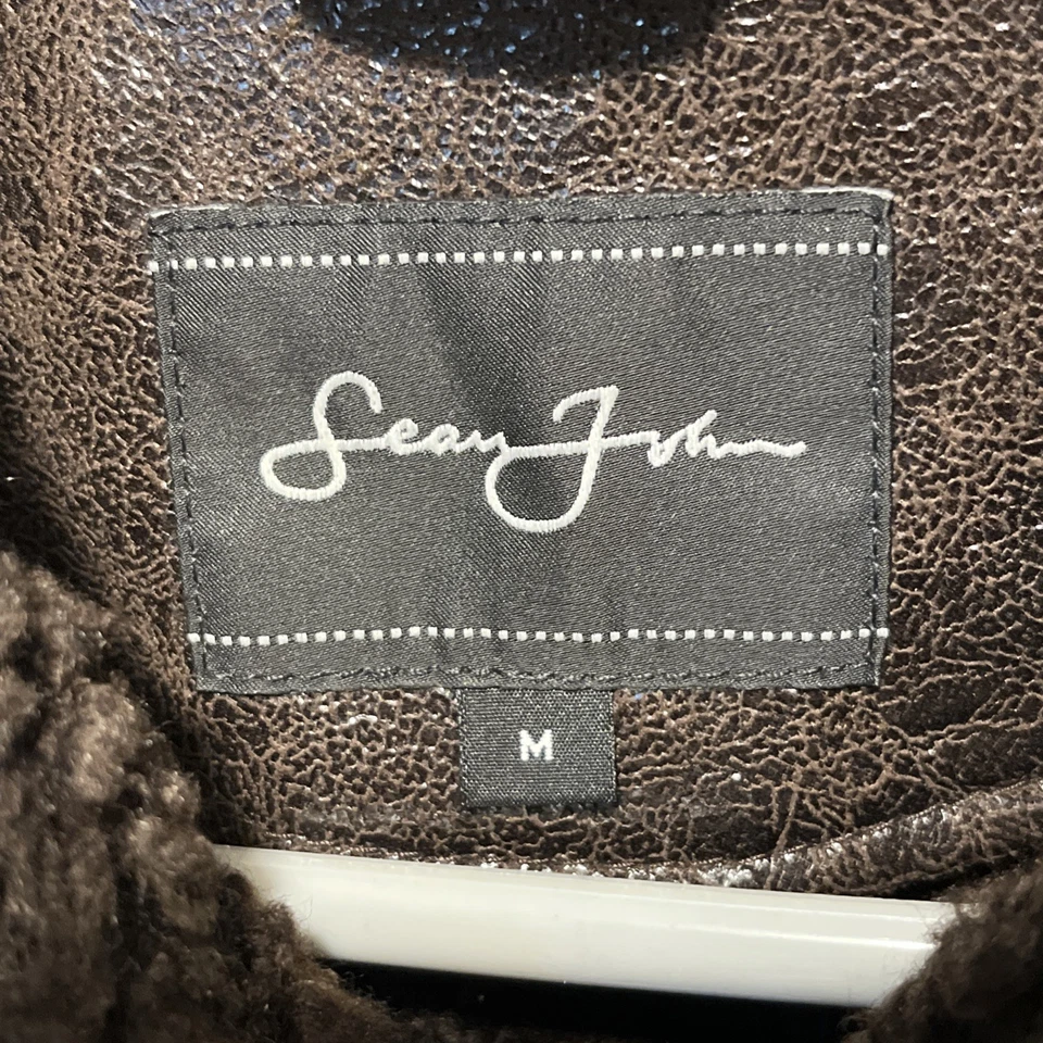 Chaqueta de motocicleta Sean John de piel de oveja sintética para hombre con ribete de sherpa Foto 3 de 4