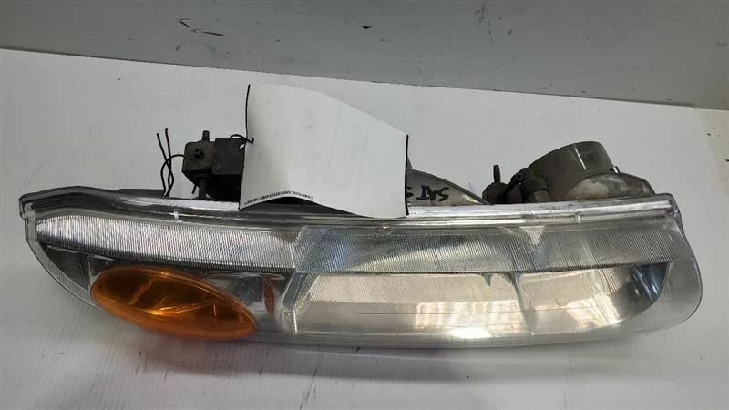 1995-1997, Saturn SL1, faro derecho pasajero, número de pieza: 21112455 Foto 2 de 4