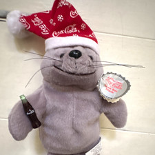 Coca-Cola Plush Gray Seal with Red Santa Hat Holding Coke Bottle, Soda Theme