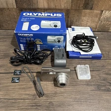 Olympus Stylus 1000 10.0MP Digital Camera  complete with box 2 x2 GB CARDS