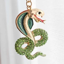 Elegant Snake Keychain with Green Crystal Accents – Symbol of 2025