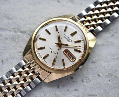 März 1975 Seiko Herrenuhr Bicolor Automatik Goldarmband Silber Tag Datum