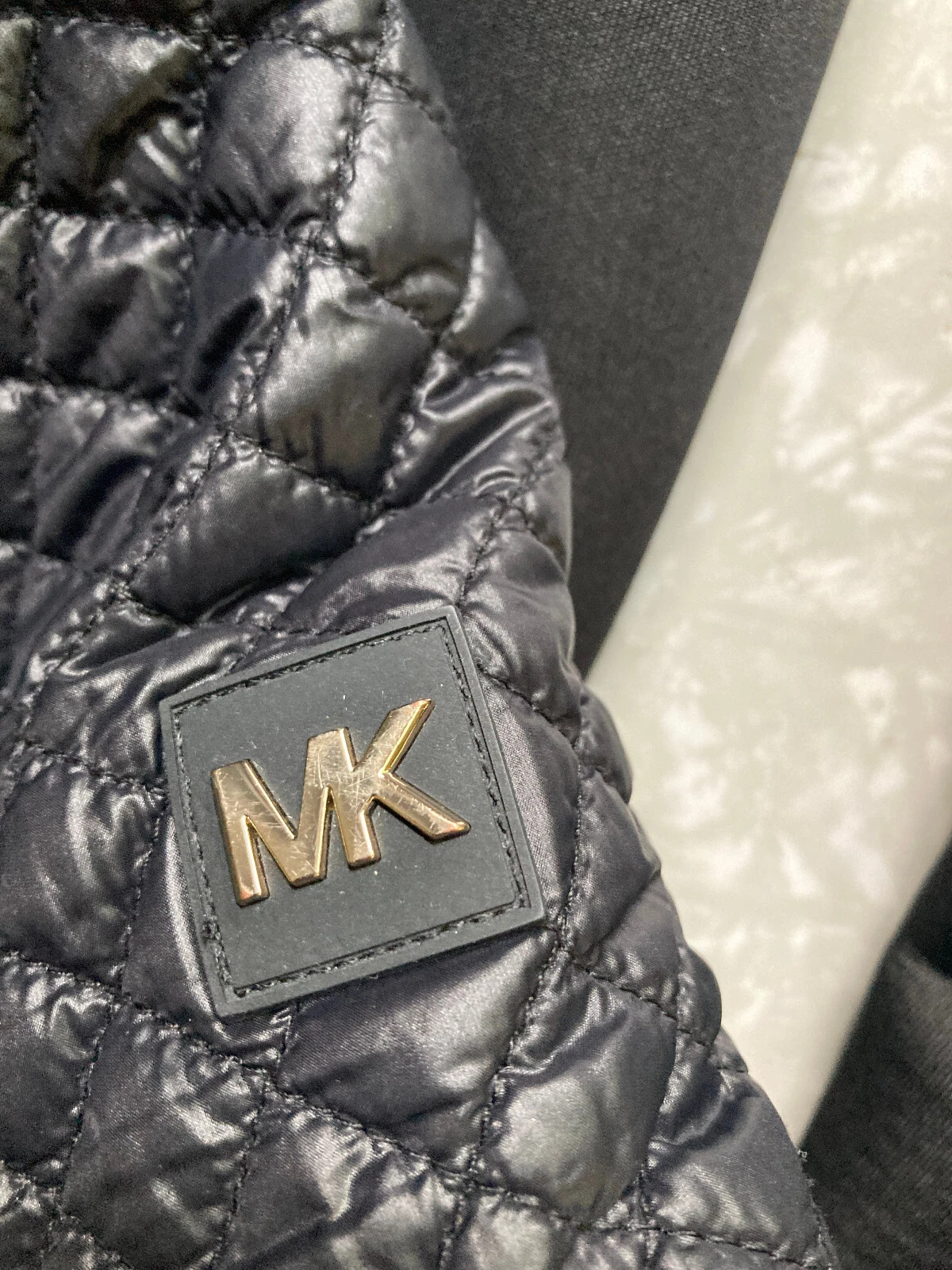 Giacca trapuntata media mista Michael Kors taglia S con cappuccio e maniche in neopreen