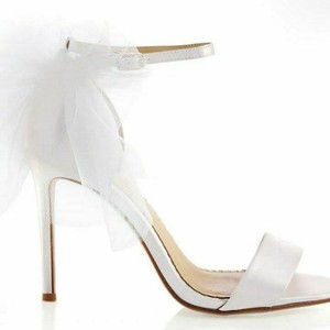 white heels with bow