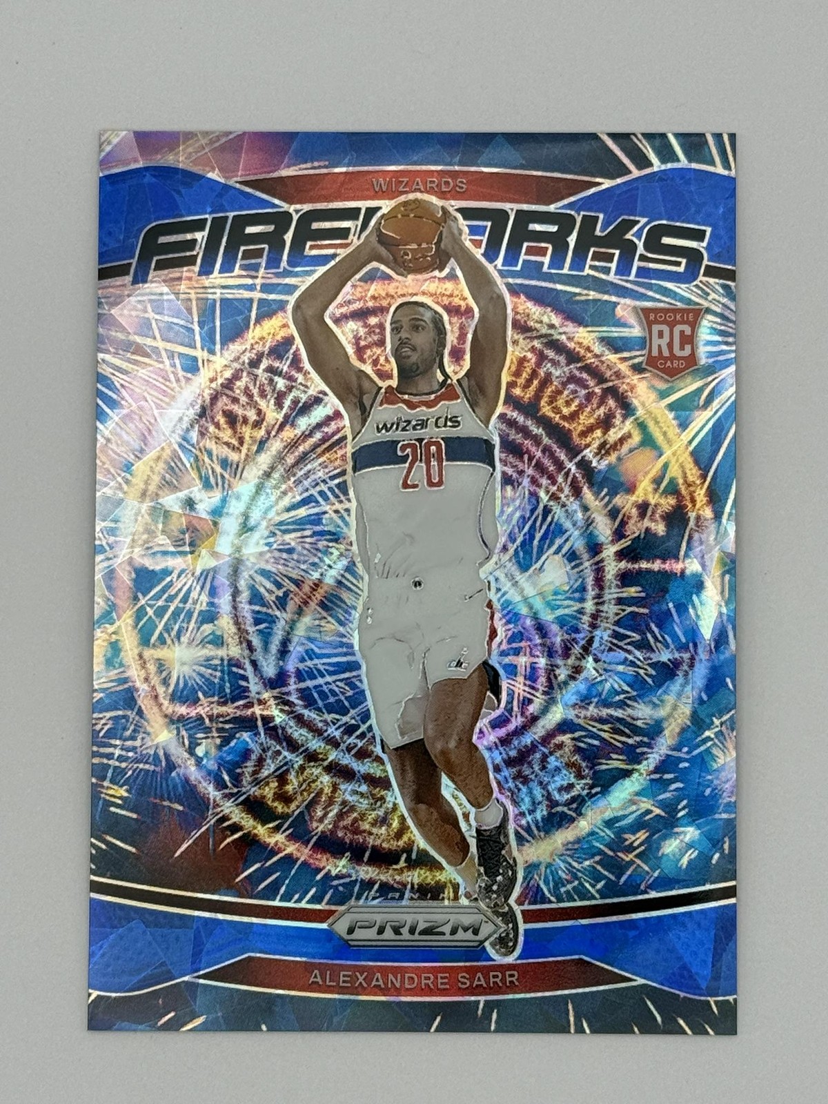 2024-25 Panini Prizm #21 Alexandre Sarr Fireworks Prizms Blue Ice #/125