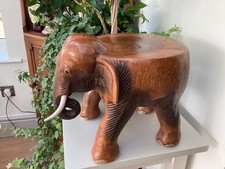 STUNNING LARGE HEAVY ELEPHANT, SEAT, LAMP TABLE, CARVED BEAUTIFULLY. WITH TUSKS.