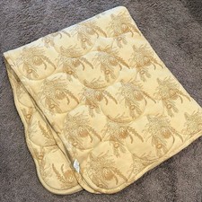 Kate Quinn tan protea organic cotton quilt