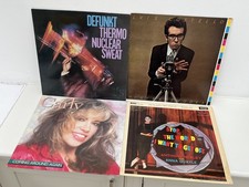 ELVIS COSTELLO, CARLY SIMON, DEFUNKT, STOP THE WORLD I WANT TO GET OFF VINYL LPS