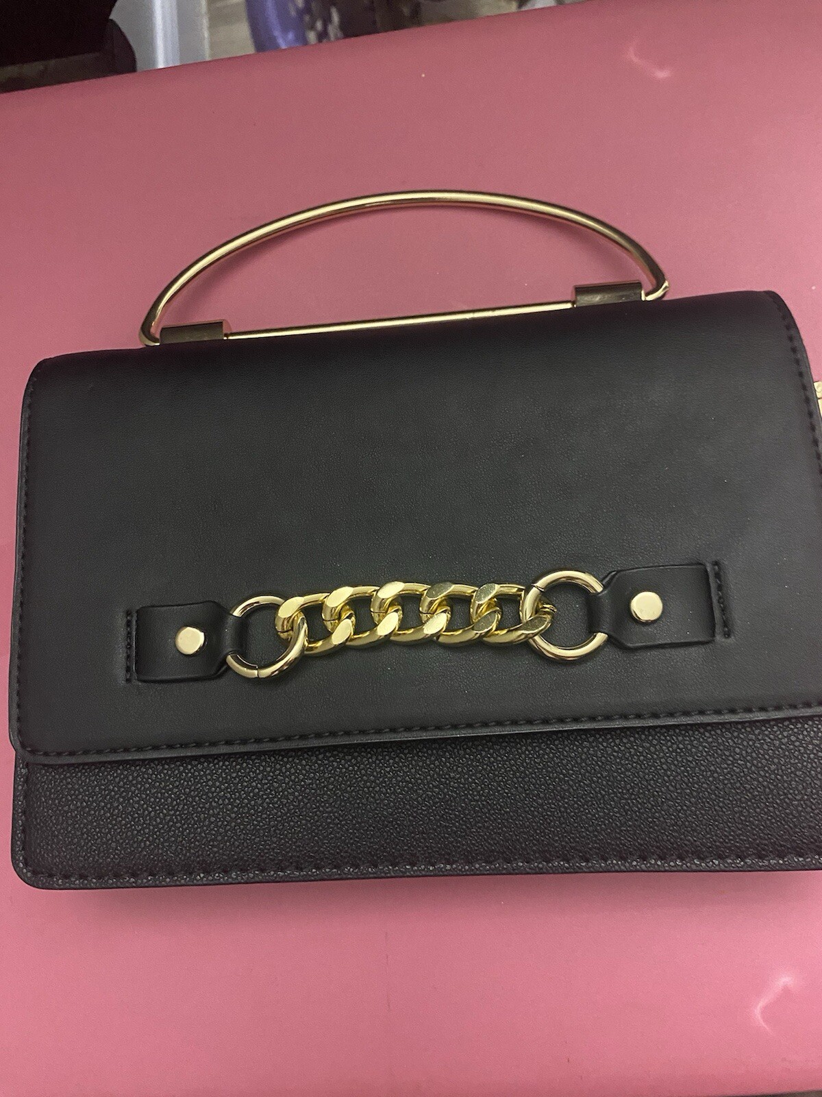 Aldo small black leather crossbody bag with gold hardware