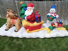 GEMMY Airblown Inflatable 13' FT Santa Sleigh Light Show & Holiday Music Songs