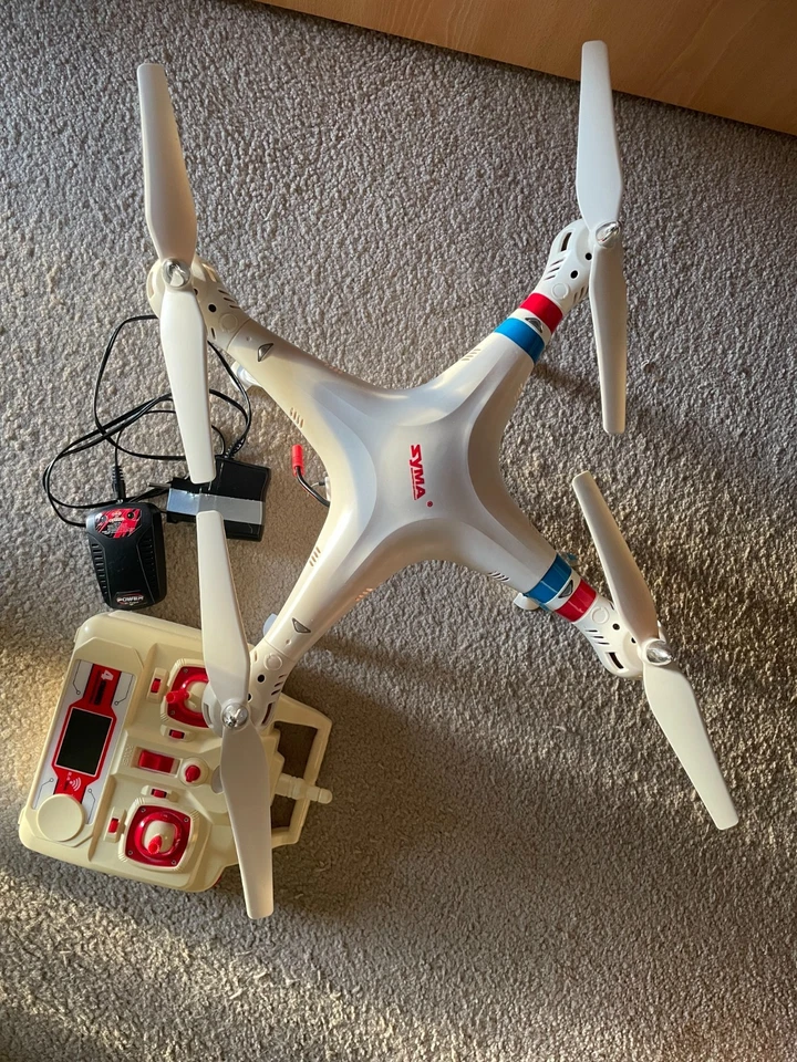 syma Quadrocopter mit Kamera Fernbedienung Ladestadion Drohne ohne Akku defekt - Bild 3 von 4