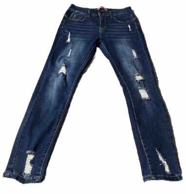 Jeans ajustado para mujer, pantalón de mezclilla rasgado.