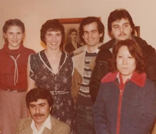 1970s Group Portrait Men Women Friends Smiling Indoor Casual