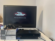 Ps2 - fully working comes with 8 games, offical ps2 controllers& wires