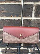 NWT$175 Coach C2327 Wyn Tan Rust C Signature Canvas Coated  Slim Envelope Wallet