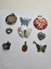 LOT OF 101 GRAMS OF .925 STERLING SILVER LADIES PENDANNTS SOME VINTAGE - MODERN 69.29 per troy oz