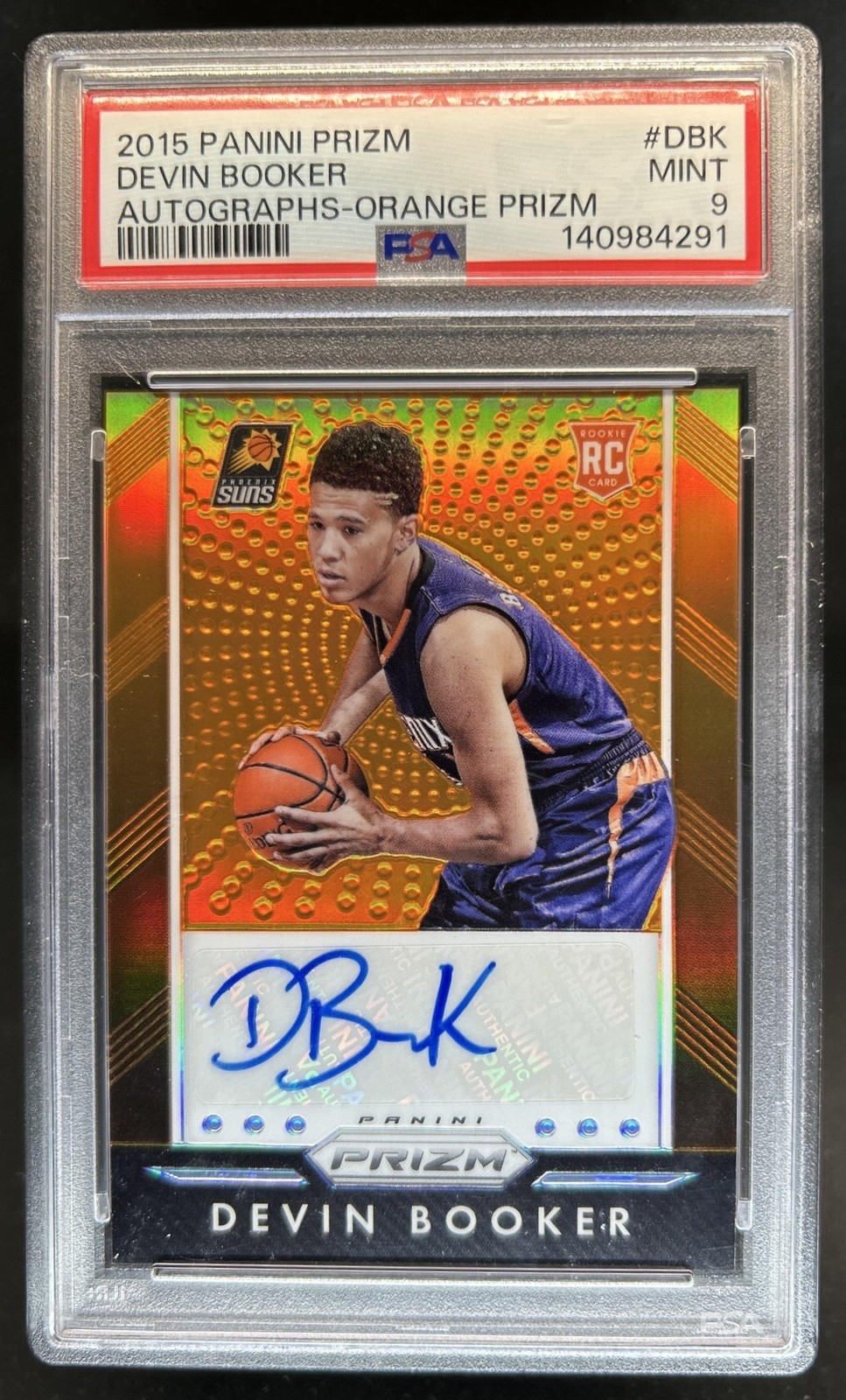 2015-16 Panini Prizm Devin Booker Auto Orange RC Rookie #/65 Suns PSA 9 view 1