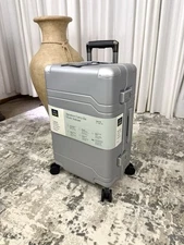 Signature Hardside Trunk Carry On Spinner Suitcase  - Open Story