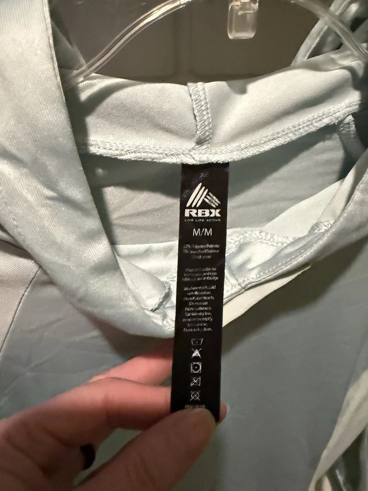 Sudadera con capucha ligera RBX azul cielo talla mediana para mujer manga larga Foto 3 de 4