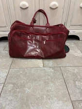 Medici firenze genuine leather  luggage/duffle bag with wheels  made in Italy 