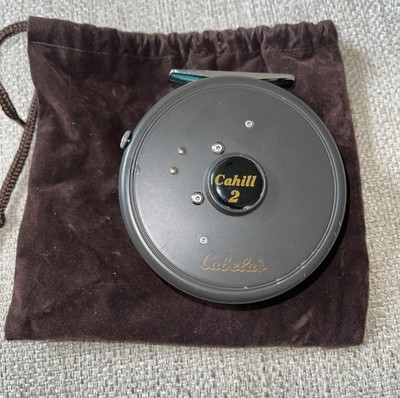 Cabela's Cahill 2 Disc Drag Fishing Reel Black with Line and Bag Case