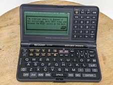 Sharp Wizard OZ-5500 256KB Personal Information Organizer For Parts/Repair