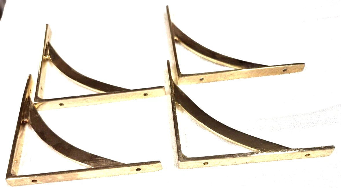 4 PC. SOLID BRASS SHELF BRACKETS 4 PC. 6" X 6" H.D. HAS A LITTLE TARNISH
Opens in a new window or ta
