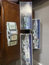 Lot Of 3 Hess Truck 2002, 2003, And 2004 , And 1993 Police Car