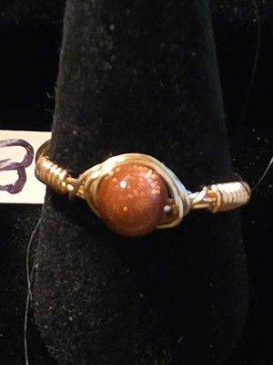 Handmade size 8 Wire-Wrapped Goldstone Ring with Gold-Tone Plated Wire