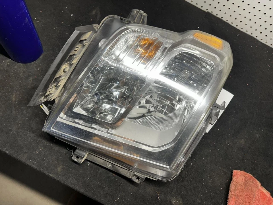 Passenger Headlight Halogen Chrome Interior Bezel Fits 16-19 TITAN XD 2050713 - Image 3 of 4