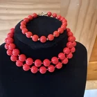 Vintage red beaded necklace and red bracelet costume jewelry